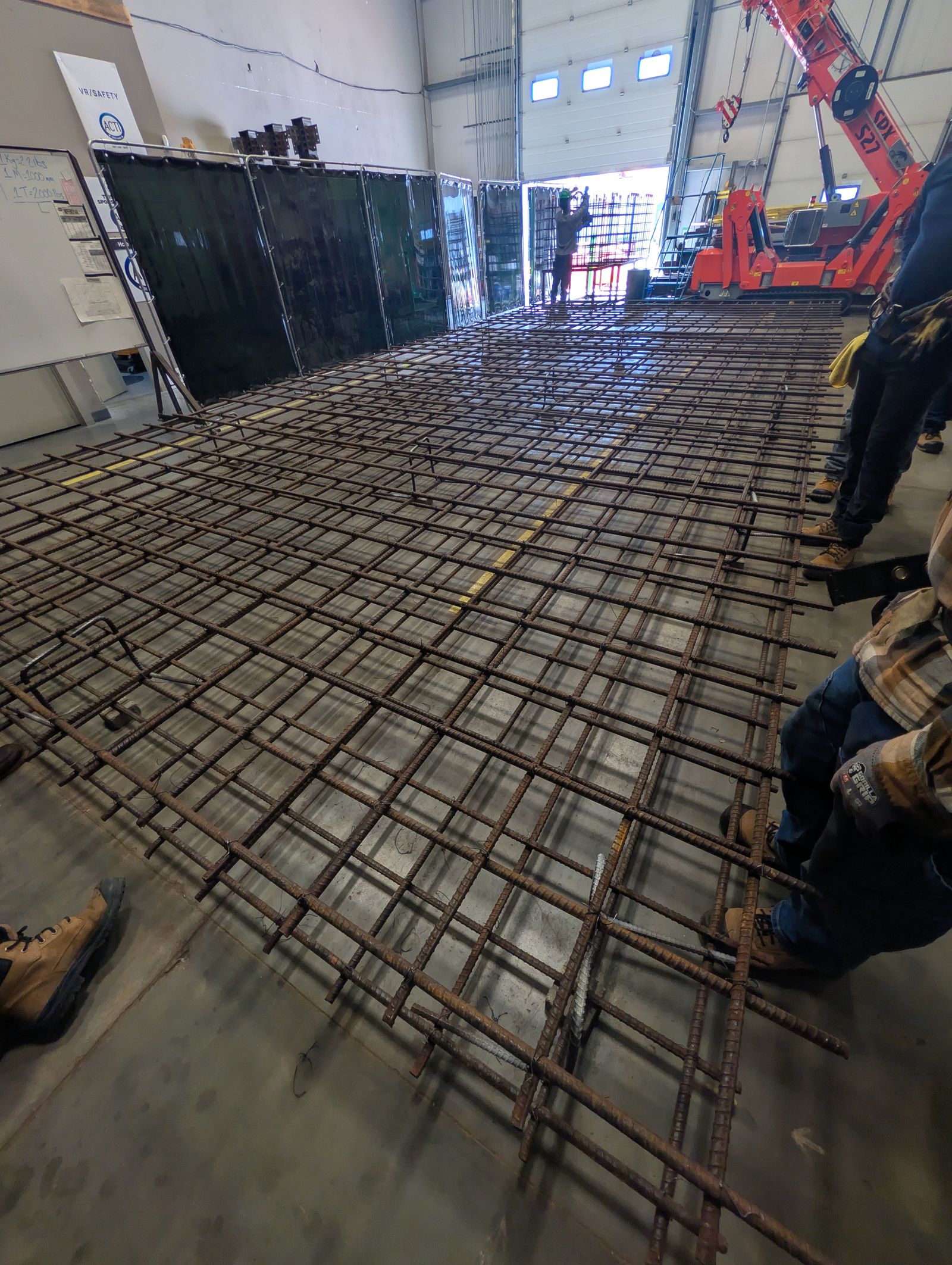 Double-layer reinforcing bar mat built to spec on the Local 720 rebar shop floor.